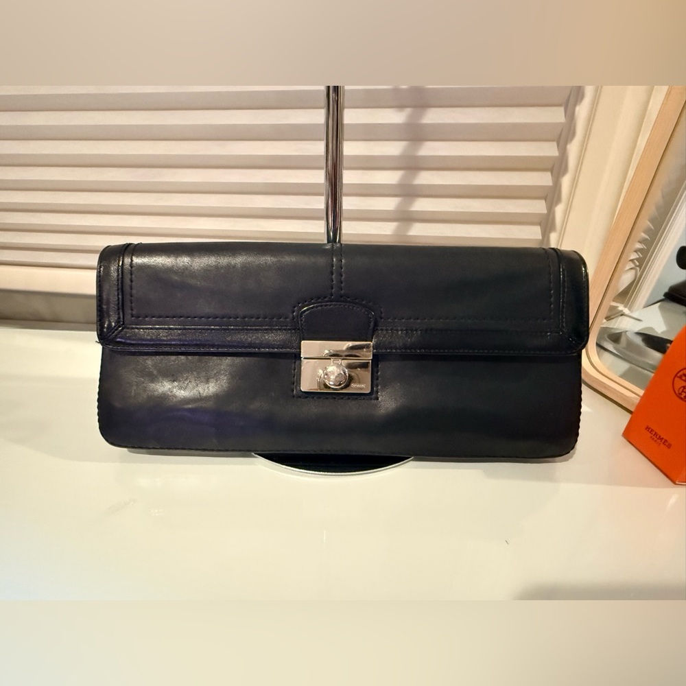 Coach Kristin Black Leather Clutch Purse with a silver-tone push-lock closure